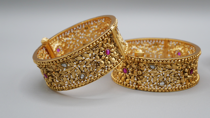 Angola - Gold meenakari kada with ruby and white stones