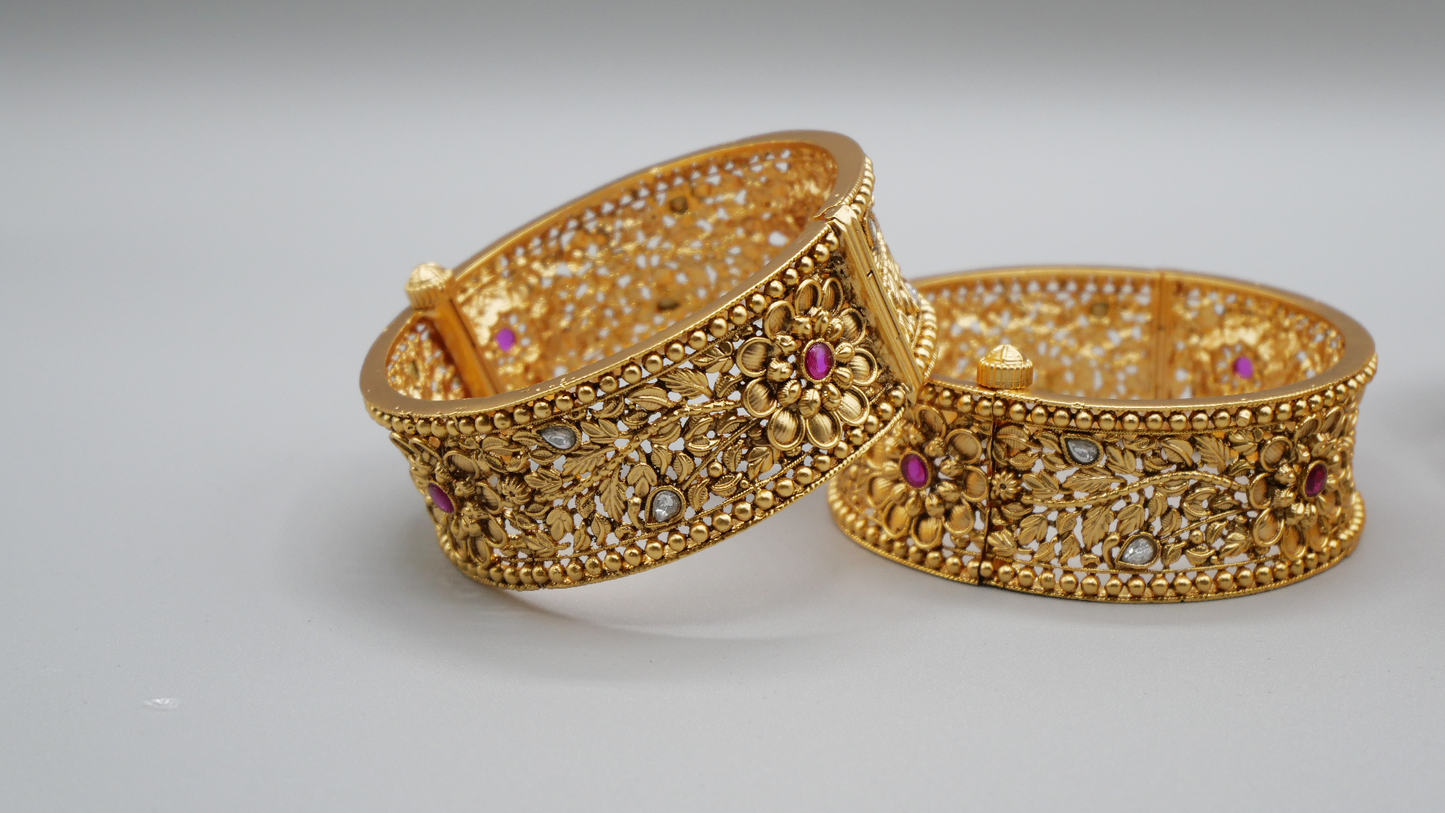 Angola - Gold meenakari kada with ruby and white stones