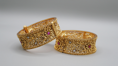 Angola - Gold meenakari kada with ruby and white stones